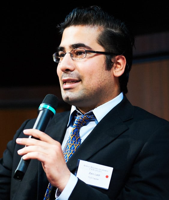 Zain Latif, Founder & CEO of TLG Capital, speaking at a conference